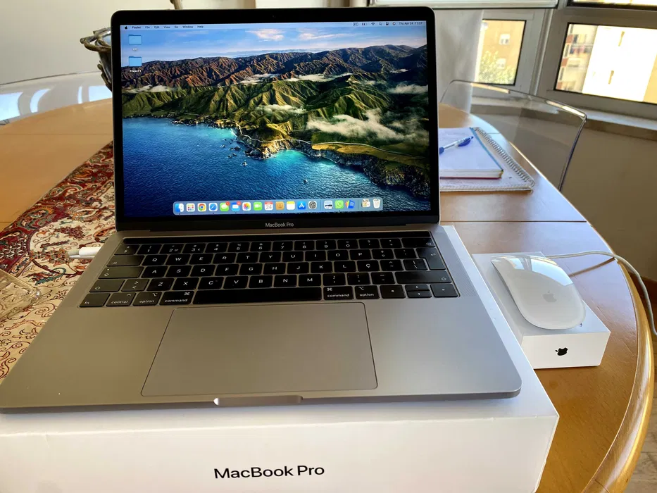 MacBook Pro 13, Touch Bar, plus a Magic Mouse